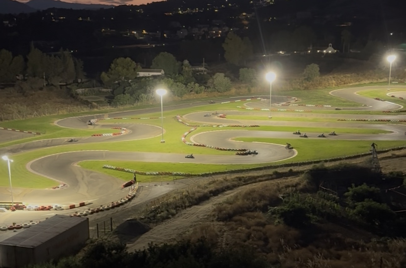 Illuminated Mijas Karting site after dark